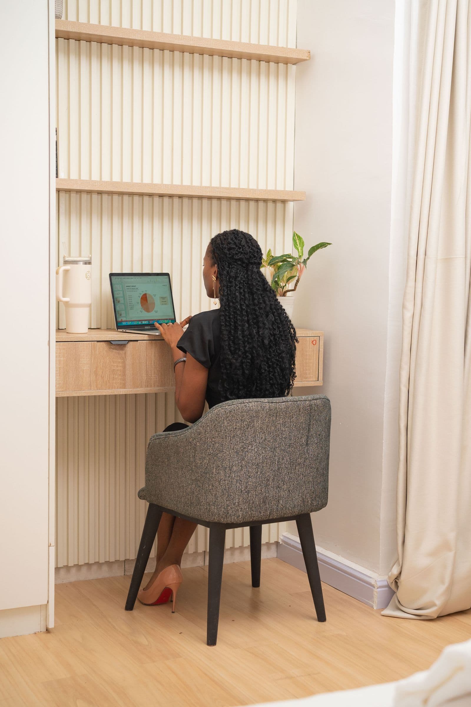 African creator working from a home office